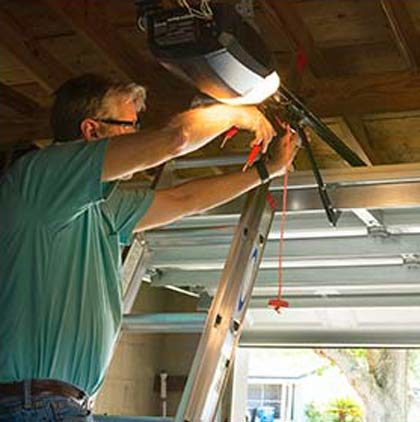 Stock image of a person repairing in garage