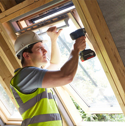 Stock image of a person working on Exterior of home