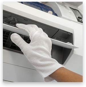 Stock image showing cleaning of Air duct with hand