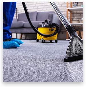 Stock image showing cleaning of carpet with tools